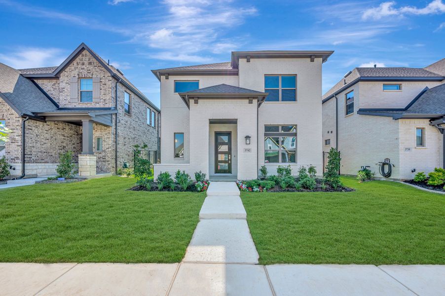 Front exterior of a new home in Goodland – Garden Series, Grand Prairie, TX, highlighting curb appeal (Image 1). Front exterior of a new home in Goodland – Garden Series, Grand Prairie, TX, highlighting curb appeal (Image 1).