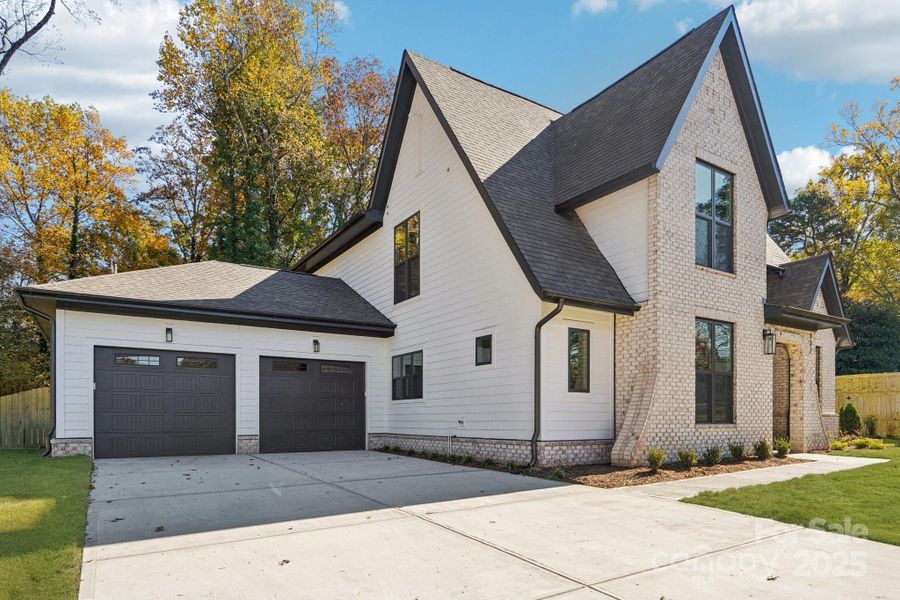 Front exterior of a new home in , Charlotte, NC, highlighting curb appeal (Image 26).