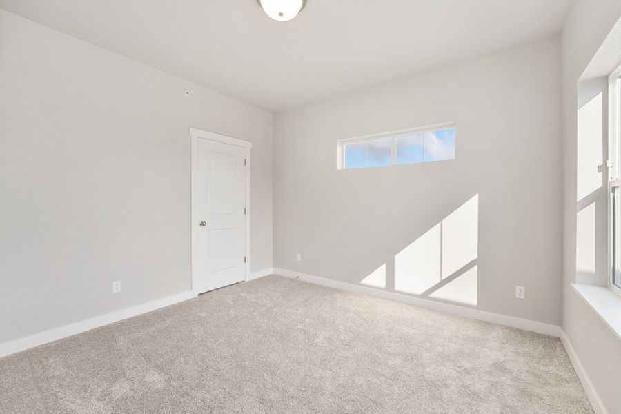 Spacious, unfurnished interior of a new home in The Lakes at Centerra, Loveland (Image 17).
