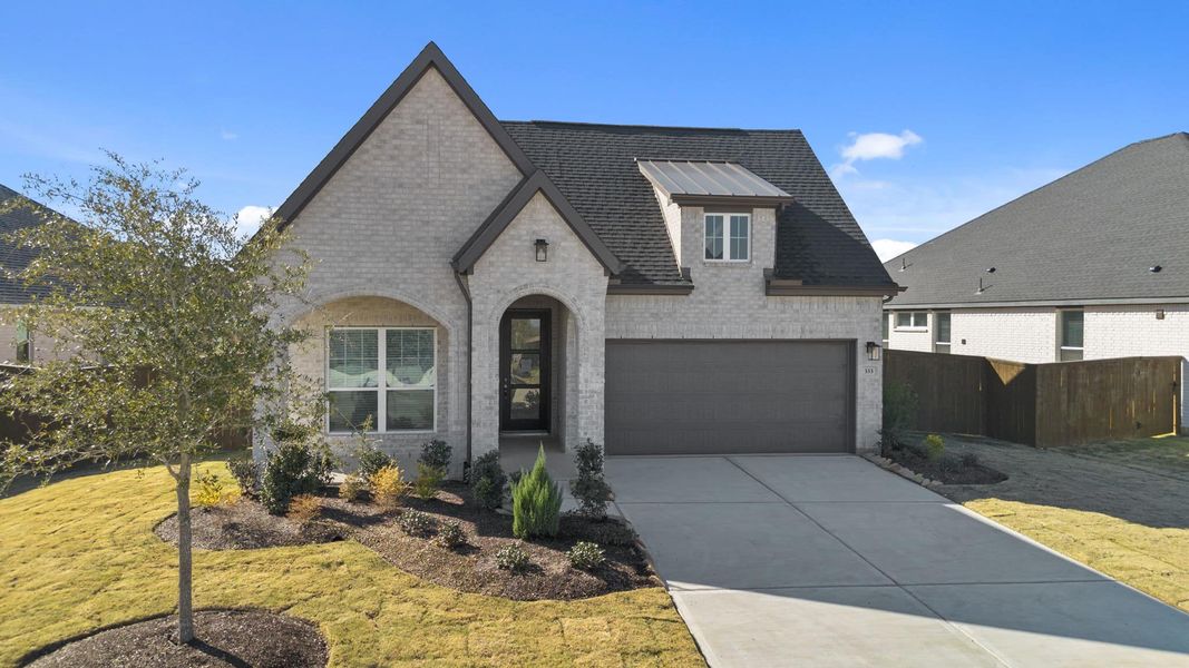 Front exterior of a new home in Attwater, Waller, TX, highlighting curb appeal (Image 20).