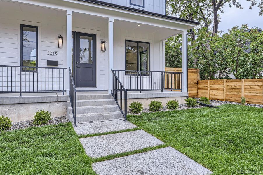 Front exterior of a new home in , Wheat Ridge, CO, highlighting curb appeal (Image 24).