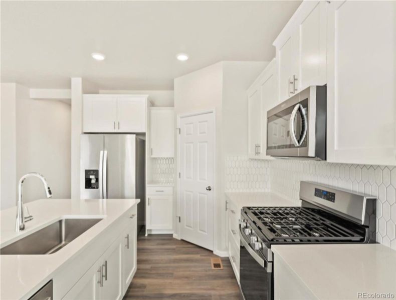Furnished interior view inside a new home in Buffalo Highlands: The Flora Collection, Commerce City (Image 3).