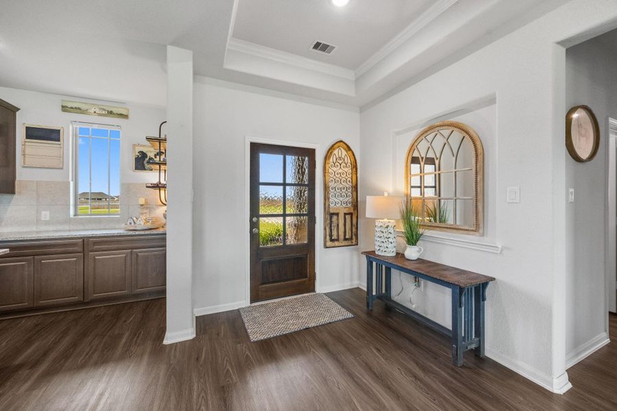 Expansive windows let in tons of natural light and provide a beautiful view of the back yard!