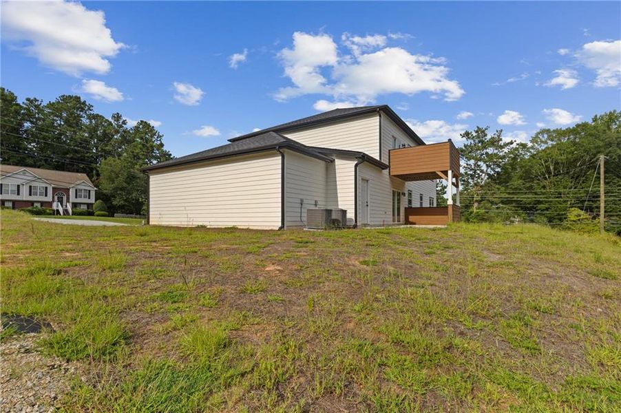 Front exterior of a new home in , Sugar Hill, GA, highlighting curb appeal (Image 15).