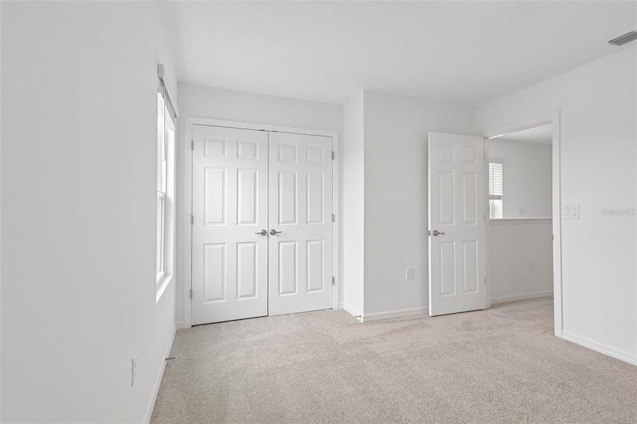 Spacious, unfurnished interior of a new home in Eagletail Landings, Howey-in-the-Hills (Image 33).