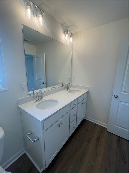 Furnished interior view inside a new home in Springwood Grove, Central (Image 8).