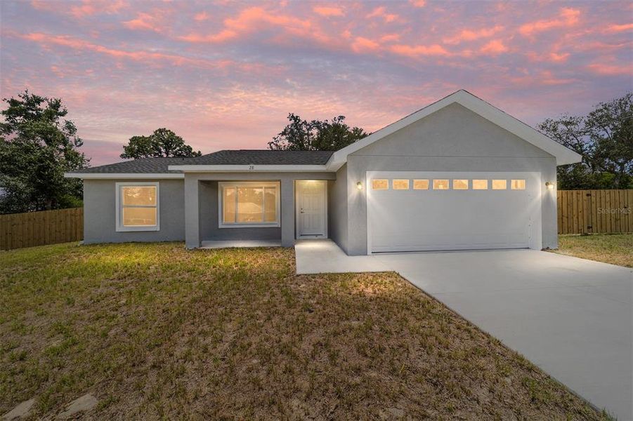 Front exterior of a new home in , Ocklawaha, FL, highlighting curb appeal (Image 16).