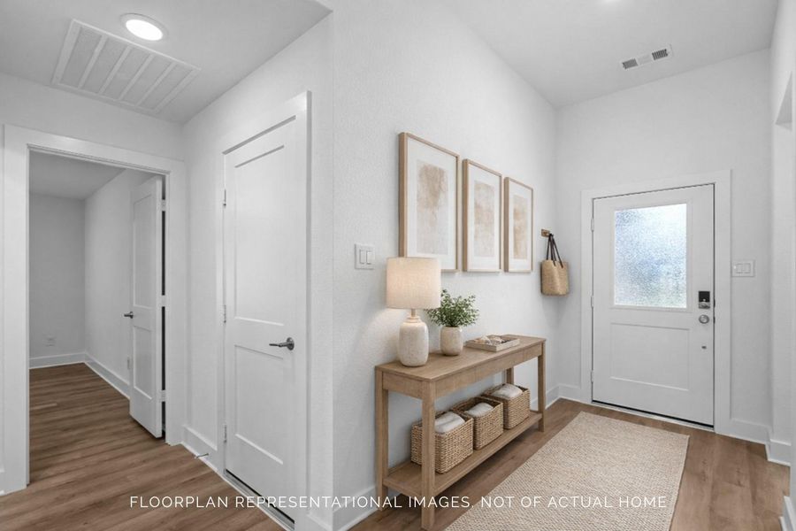 Furnished interior view inside a new home in Pinewood at Grand Texas, New Caney (Image 11).