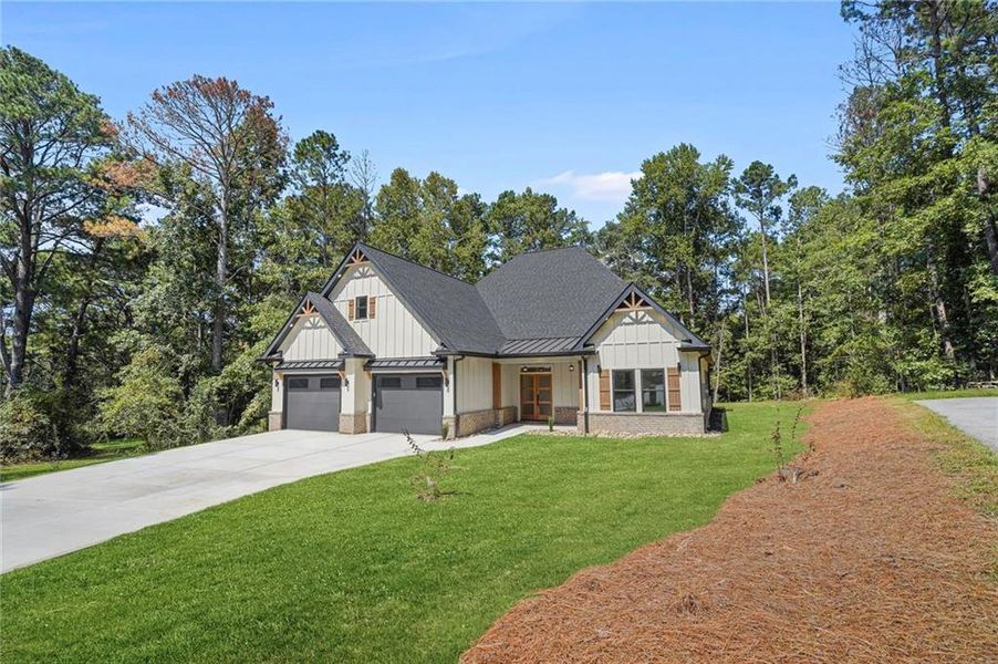 Front exterior of a new home in , Snellville, GA, highlighting curb appeal (Image 2).