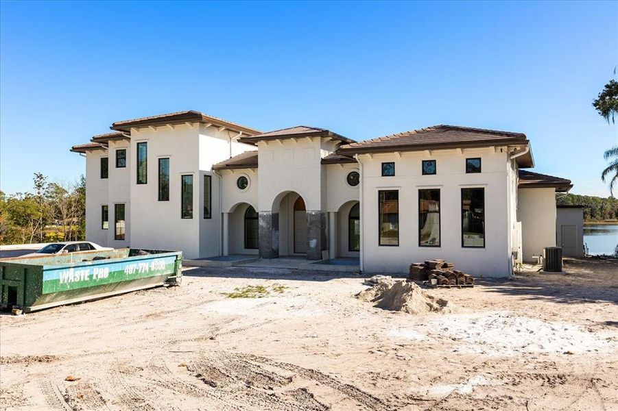 In-progress construction of a new home in , Lake Mary, FL (Image 9).