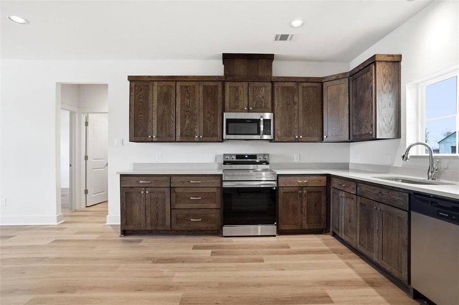 Furnished interior view inside a new home in , Sanger (Image 7).