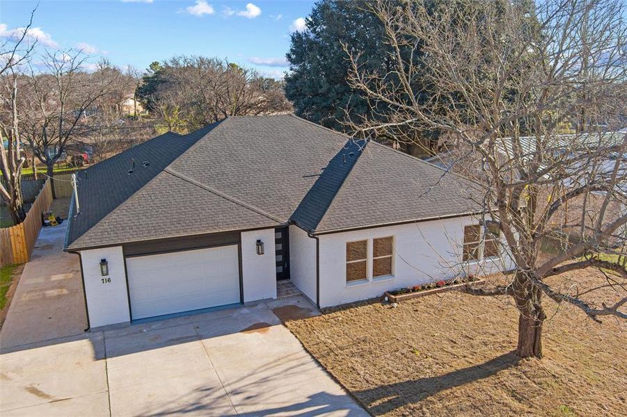 View of front of property with a garage