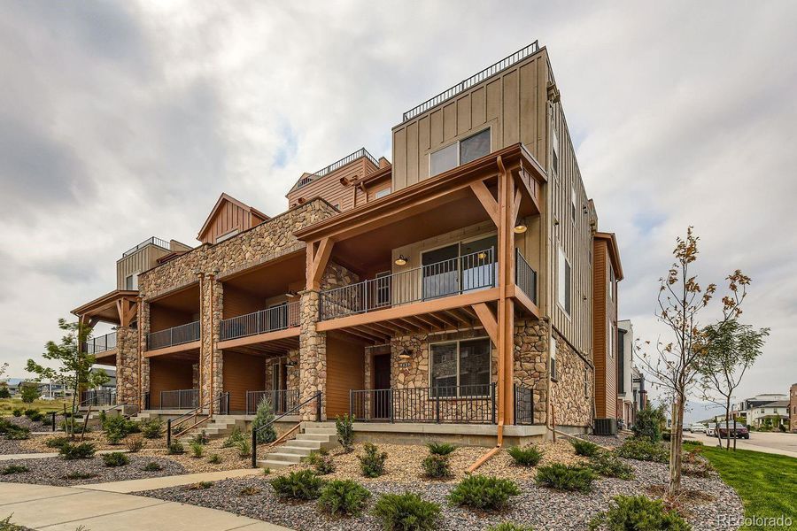 Front exterior of a new home in , Littleton, CO, highlighting curb appeal (Image 2).
