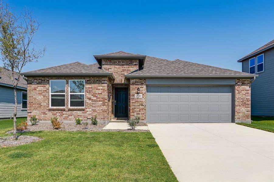 Front exterior of a new home in River Ridge, Crandall, TX, highlighting curb appeal (Image 19). Front exterior of a new home in River Ridge, Crandall, TX, highlighting curb appeal (Image 19).