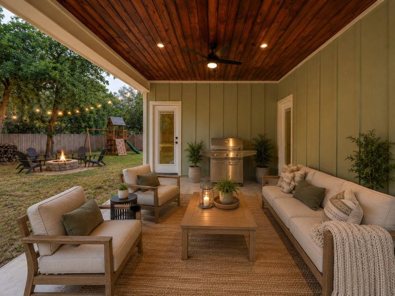 An inviting outdoor living space features a covered patio with rich wood ceilings, offering a serene gathering spot. An inviting outdoor living space features a covered patio with rich wood ceilings, offering a serene gathering spot.