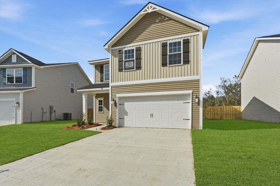 Representative exterior photo of a completed home built from the The Ryon by RTS Homes in Grand Reserve, Hinesville, GA (Image 21).