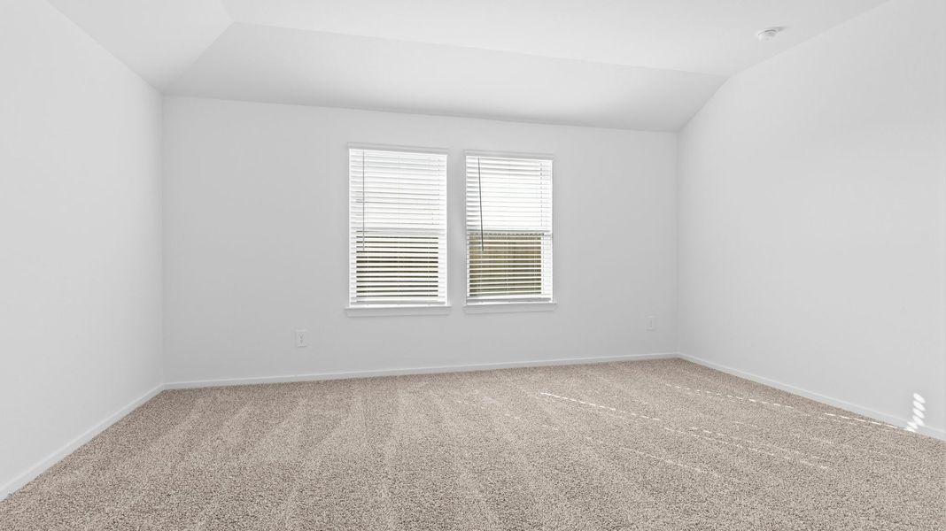 Spacious, unfurnished interior of a new home in Caldwell Crossing, Iowa Colony (Image 15).