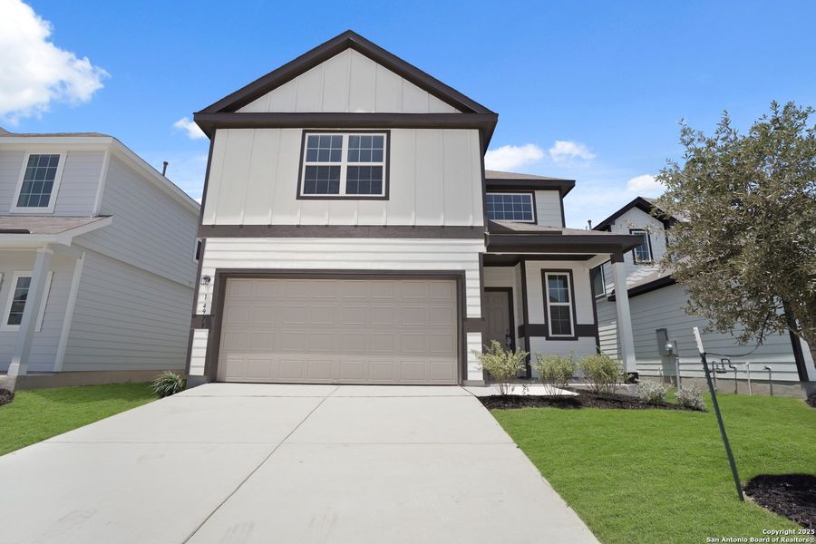 Front exterior of a new home in Timber Creek, San Antonio, TX, highlighting curb appeal (Image 18).