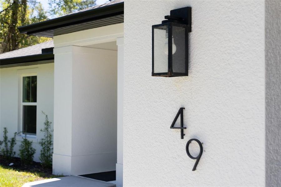 Exterior details and patio area of a home in , Port Charlotte (Image 25).
