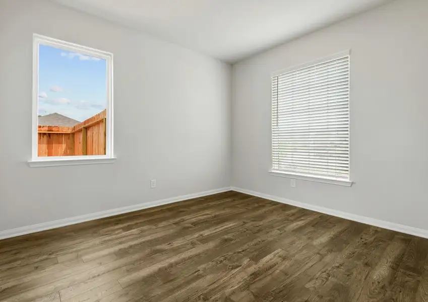 Serpate dining room with two windows