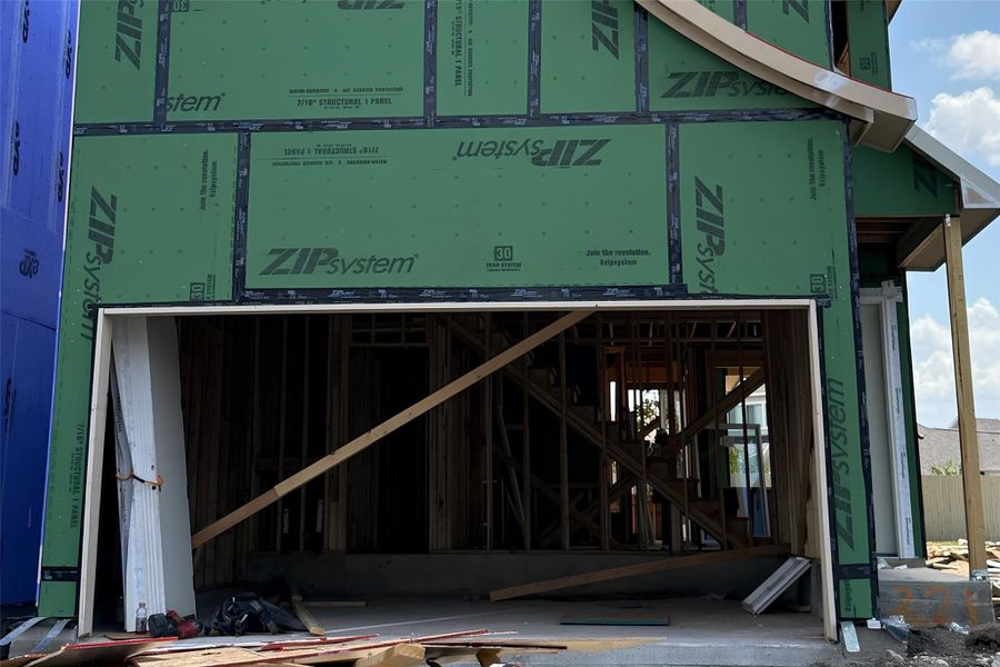 New construction framing reveals structural details during the early stages of building.