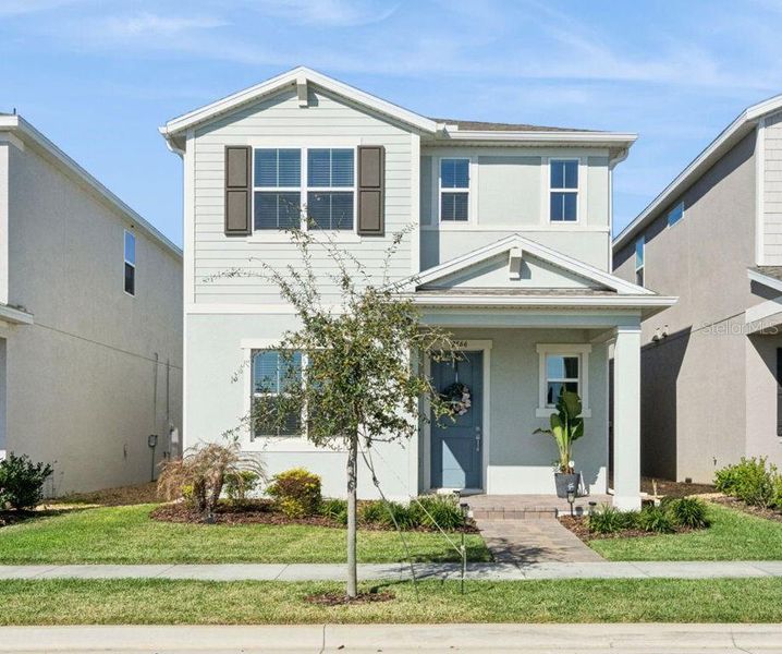 Front exterior of a new home in , Winter Garden, FL, highlighting curb appeal (Image 20).