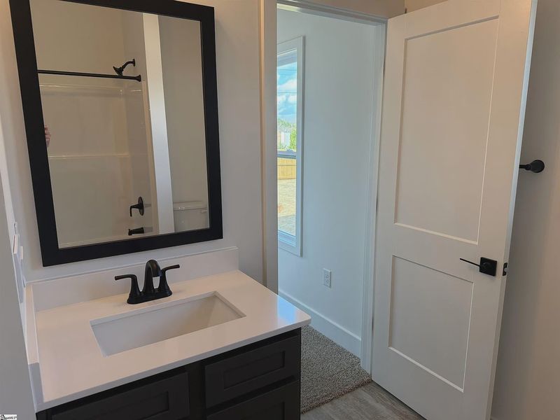 Furnished interior view inside a new home in Hidden Lake Estates, Greenville (Image 7).