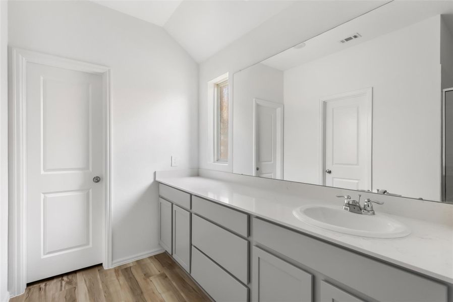 Primary bath features one sink, tons of cabinet and drawer storage. Primary bath features one sink, tons of cabinet and drawer storage.