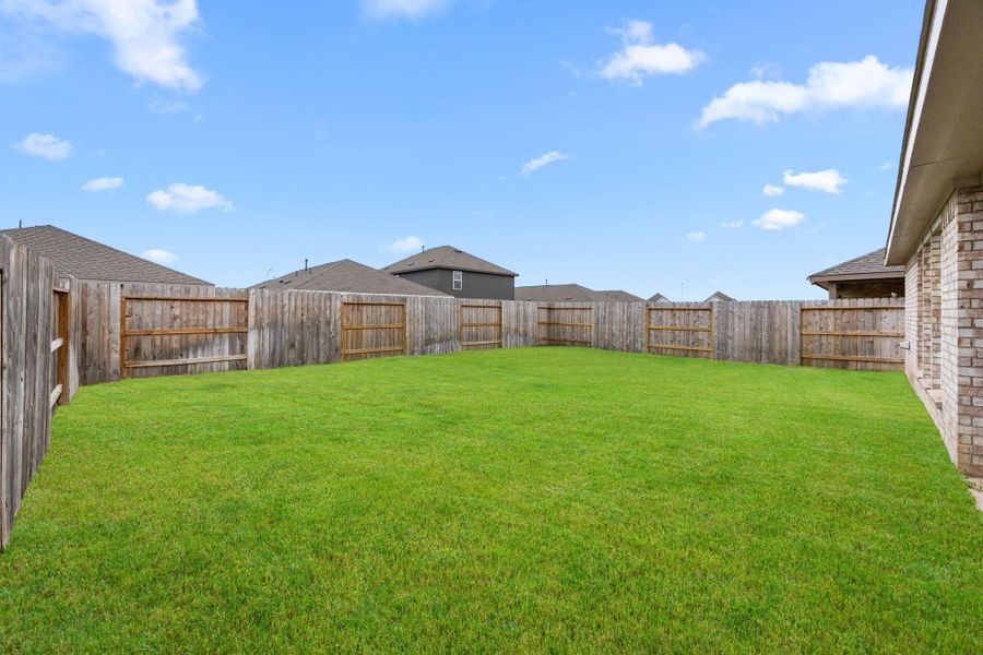 Exterior details and patio area of a home in Sunterra, Katy (Image 3). Exterior details and patio area of a home in Sunterra, Katy (Image 3).