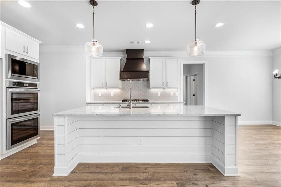 Furnished interior view inside a new home in Calgary Downs, Winder (Image 12).