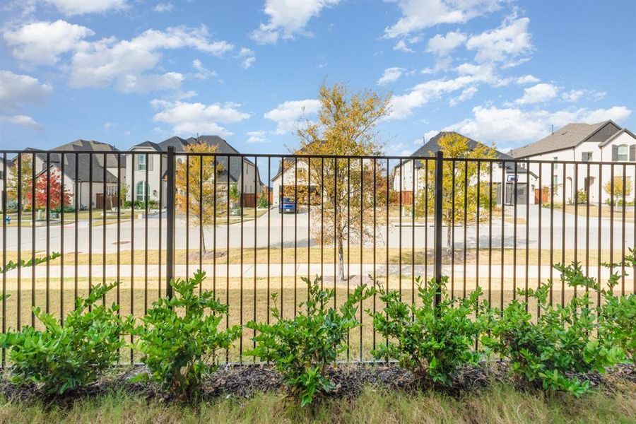 Gate featuring a residential view Gate featuring a residential view