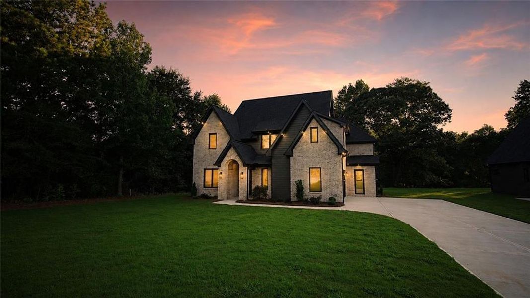 Front exterior of a new home in , Flowery Branch, GA, highlighting curb appeal (Image 25).