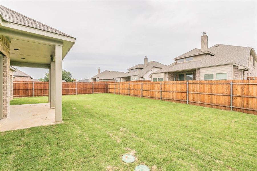 Front exterior of a new home in , Alvarado, TX, highlighting curb appeal (Image 18).