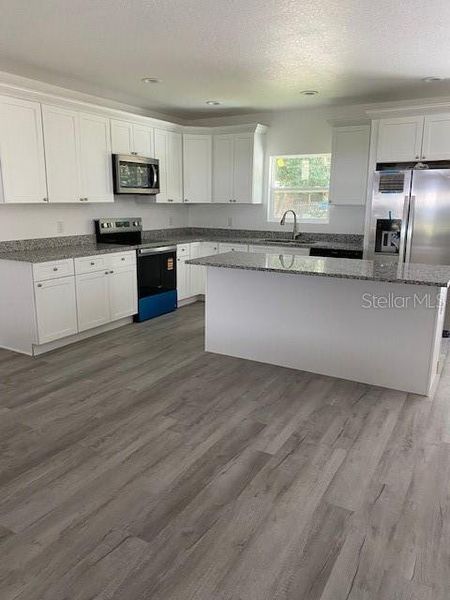 Furnished interior view inside a new home in , Gainesville (Image 7).