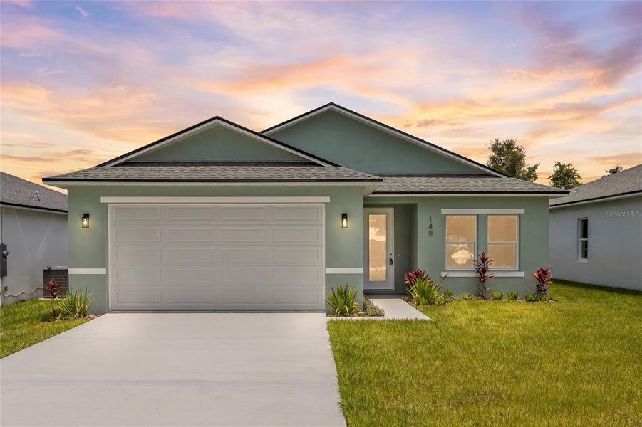 Front exterior of a new home in , Osteen, FL, highlighting curb appeal (Image 1). Front exterior of a new home in , Osteen, FL, highlighting curb appeal (Image 1).