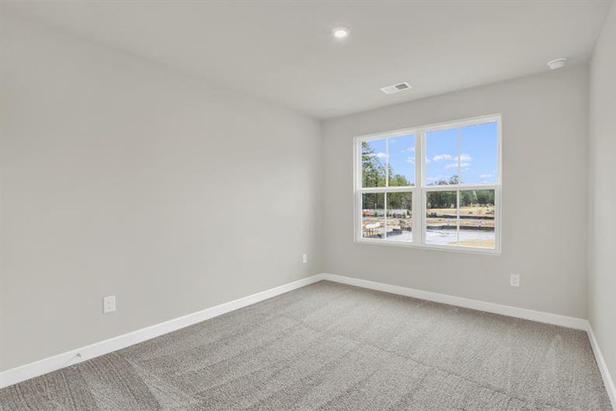 Spacious, unfurnished interior of a new home in Cobblestone at East Argent, Hardeeville (Image 22).