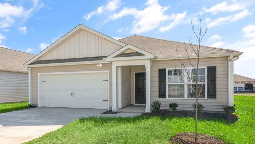 Front exterior of a new home in Madeline Farm, New Bern, NC, highlighting curb appeal (Image 19). Front exterior of a new home in Madeline Farm, New Bern, NC, highlighting curb appeal (Image 19).
