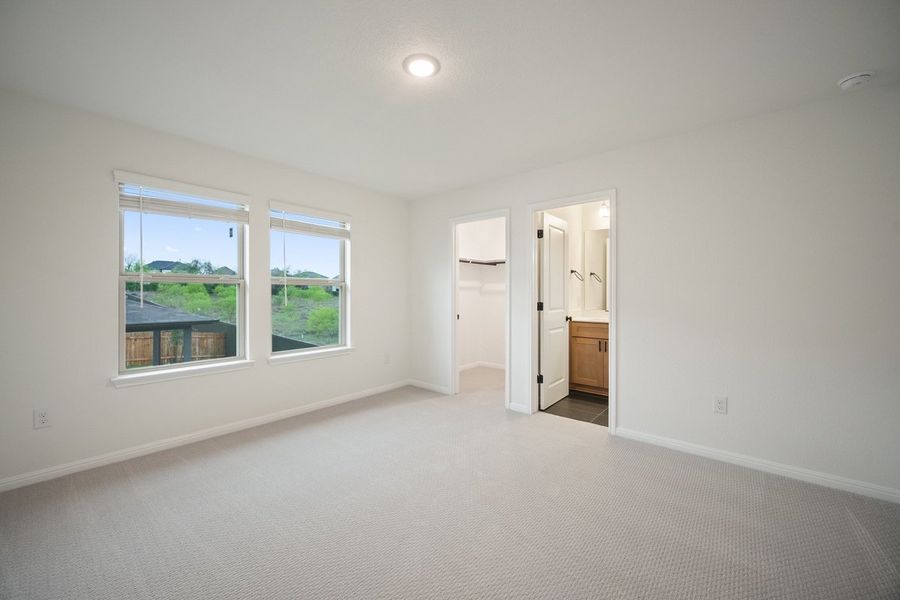 Spacious, unfurnished interior of a new home in The Hills of Bear Creek, Manchaca (Image 15).