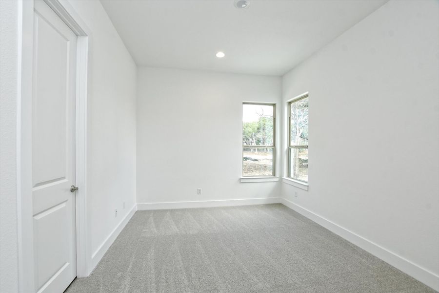 Spacious, unfurnished interior of a new home in The Hollows, Jonestown (Image 30).