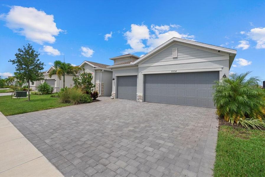 Front exterior of a new home in , Englewood, FL, highlighting curb appeal (Image 22).
