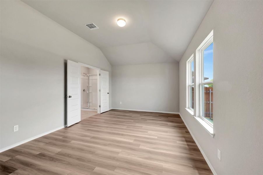 Spacious, unfurnished interior of a new home in Carillon, Manor (Image 21).
