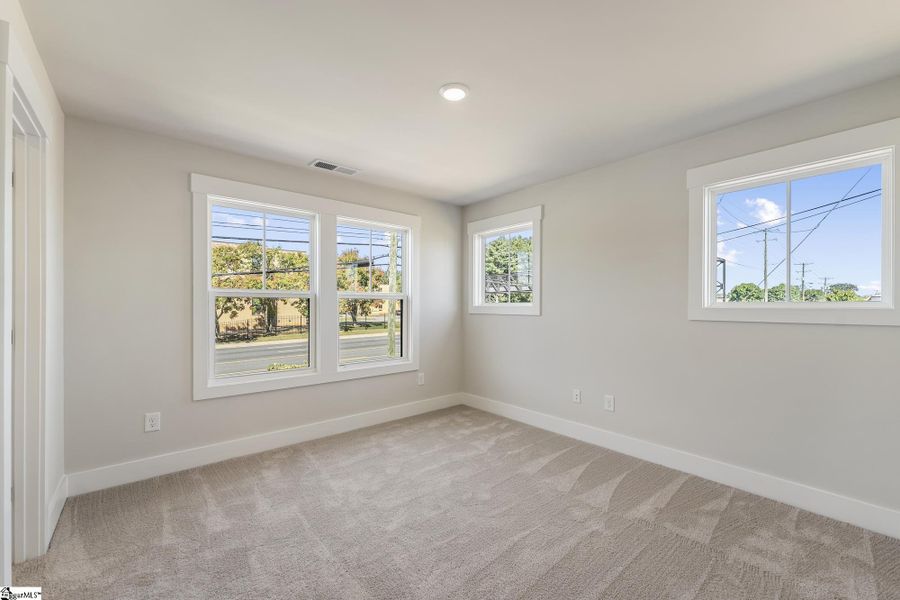 Spacious, unfurnished interior of a new home in Renaissance Place, Greenville (Image 12).