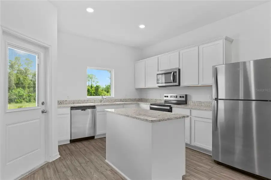 Furnished interior view inside a new home in , Poinciana (Image 3).