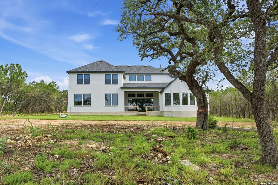 Exterior details and patio area of a home in Enchanted Bluff, San Antonio (Image 3).