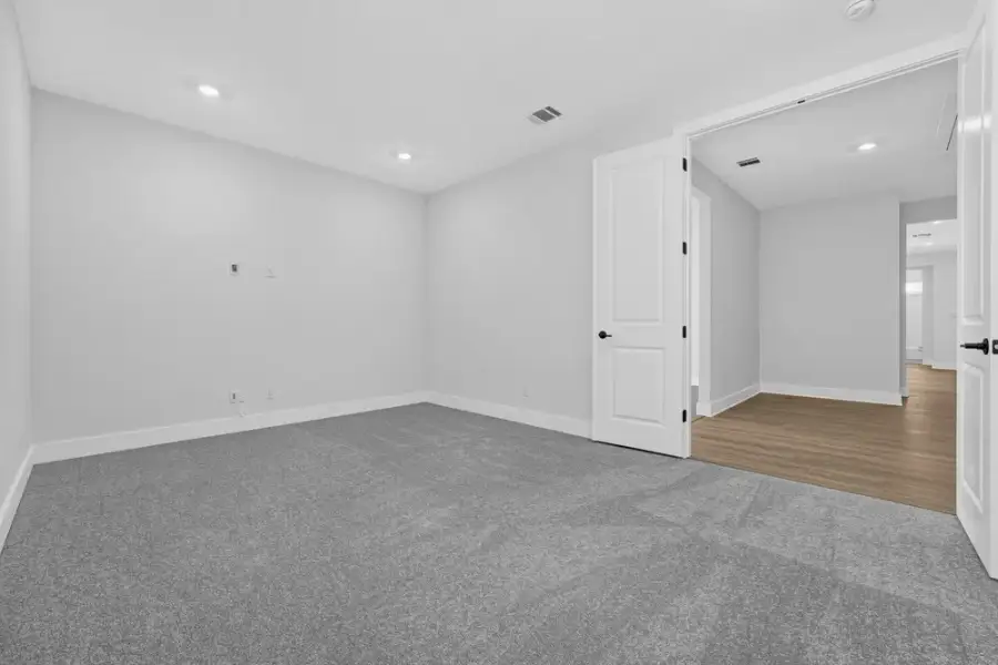 Spacious, unfurnished interior of a new home in Travisso, Leander (Image 23). Spacious, unfurnished interior of a new home in Travisso, Leander (Image 23).