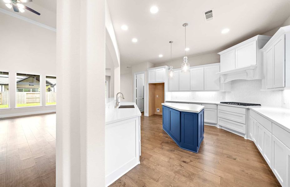 Representative furnished interior of a home built from the 4094 by Ravenna Homes in Artavia 70′, Conroe (Image 14).