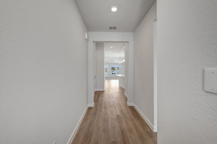 Spacious, unfurnished interior of a new home in The Meadows at Hunters Ranch, San Antonio (Image 18).