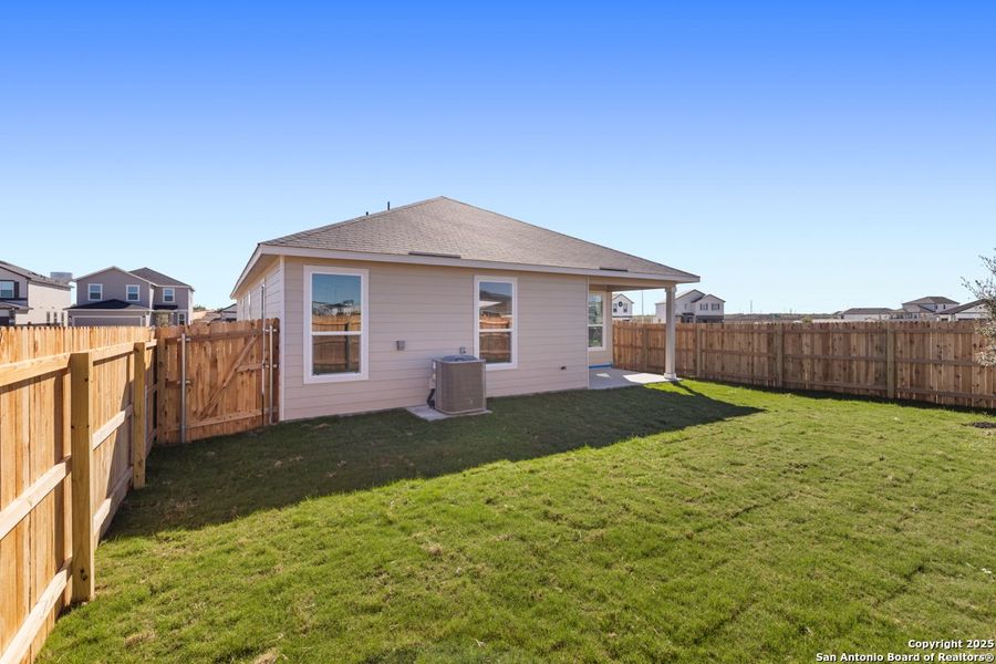 Exterior details and patio area of a home in Legend Heights, New Braunfels (Image 2).
