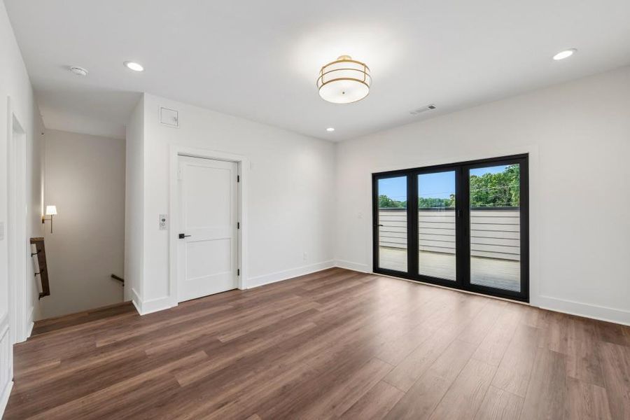 Spacious, unfurnished interior of a new home in Skyview On Broad, Sugar Hill (Image 21). Spacious, unfurnished interior of a new home in Skyview On Broad, Sugar Hill (Image 21).