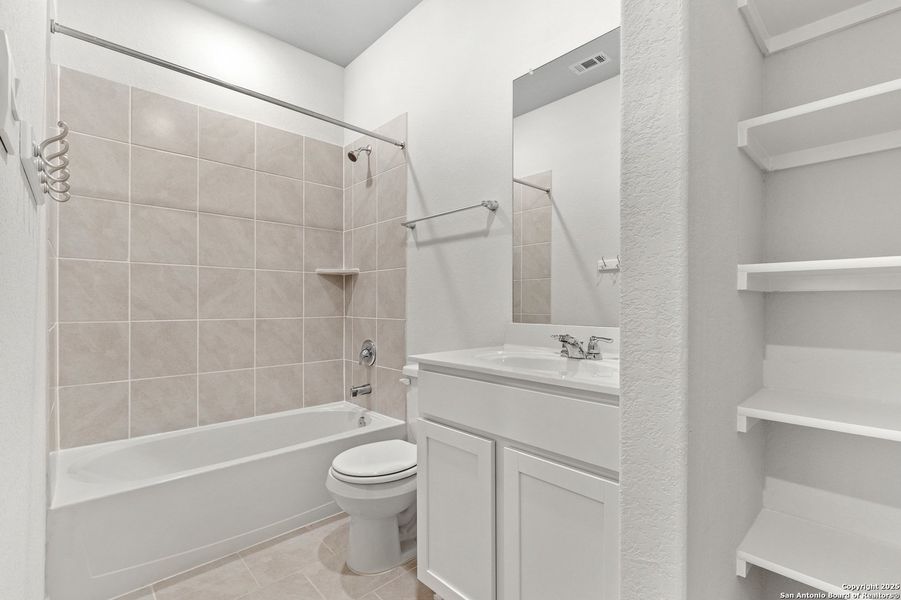 Furnished interior view inside a new home in Brookstone Creek, San Antonio (Image 8).